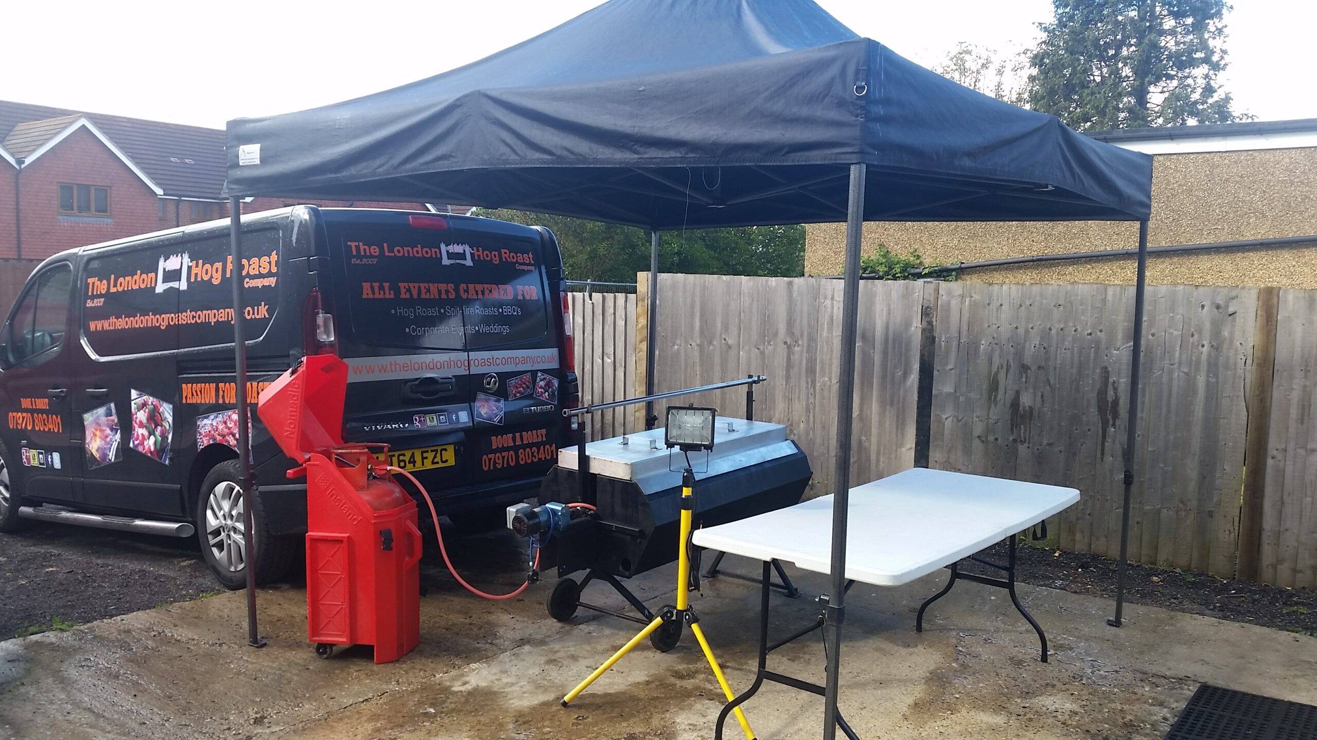 diy-hog-roast-hire gazebo and white table